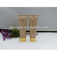 Cosmetic packaging tube with alumite cap